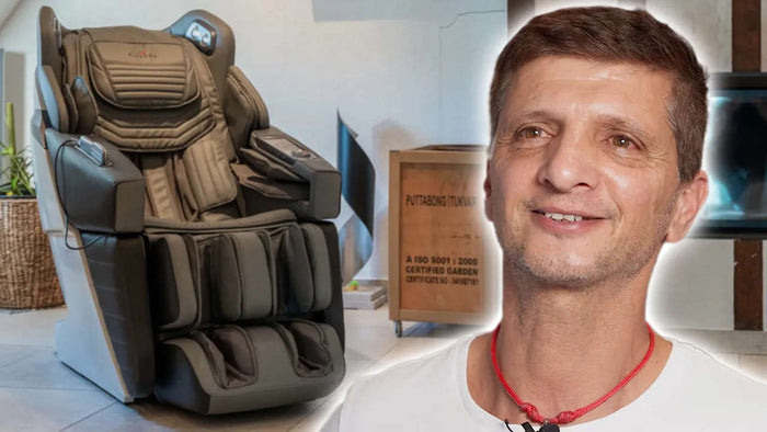 Fauteuil de massage Casada AlphaSonic III à côté d'un poêle en faïence